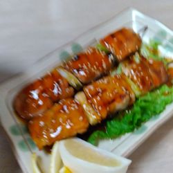 Tsuru Sushi - Glazed Chicken Skewers with lemon.