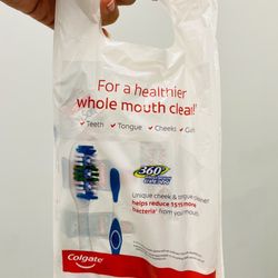 Sugar Family Dental - Goody bag with toothbrush, floss and coupons!