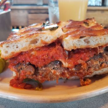 Mario's Bohemian Cafe - the meatball sandwich with some pepperoncini and a glass of hazy IPA. - Italian Near Me - San Francisco, California Mario's Bohemian Cafe - the meatball sandwich with some pepperoncini and a glass of hazy IPA. - Italian Near Me - San Francisco, California