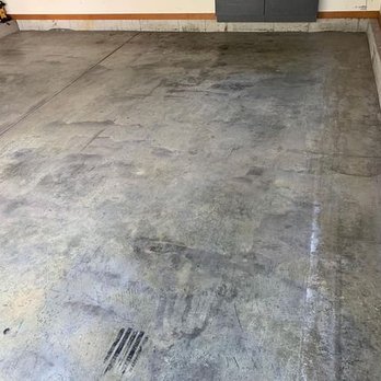 Integrity Concrete Coatings - a concrete floor in a garage - Flooring Near Me Integrity Concrete Coatings - a concrete floor in a garage - Flooring Near Me