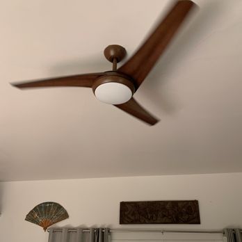 Helping Hammer - a ceiling fan in a living room - Handyman Near Me