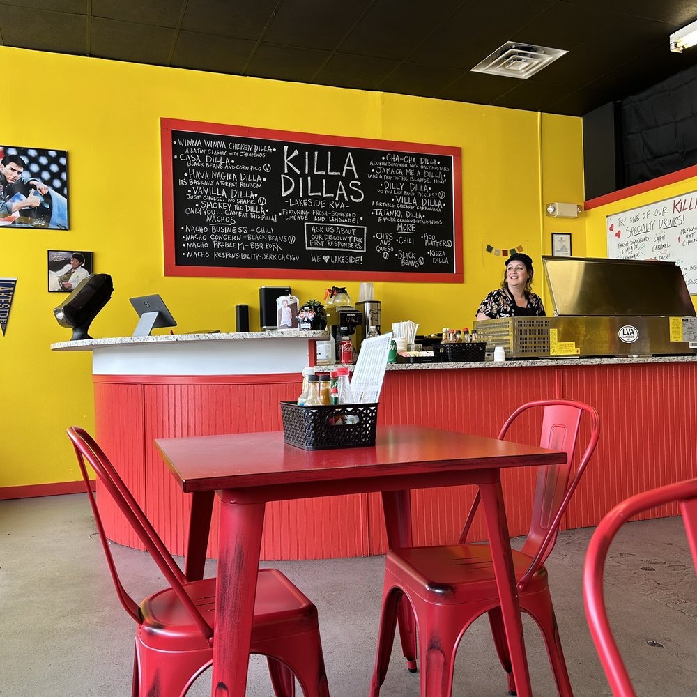 Killa Dillas - a man and a woman in a restaurant - Tex-Mex Near Me - Henrico, Virginia