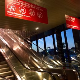 The entrance with three escalators, one going up, one for your shopping cart and one going down The entrance with three escalators, one going up, one for your shopping cart and one going down