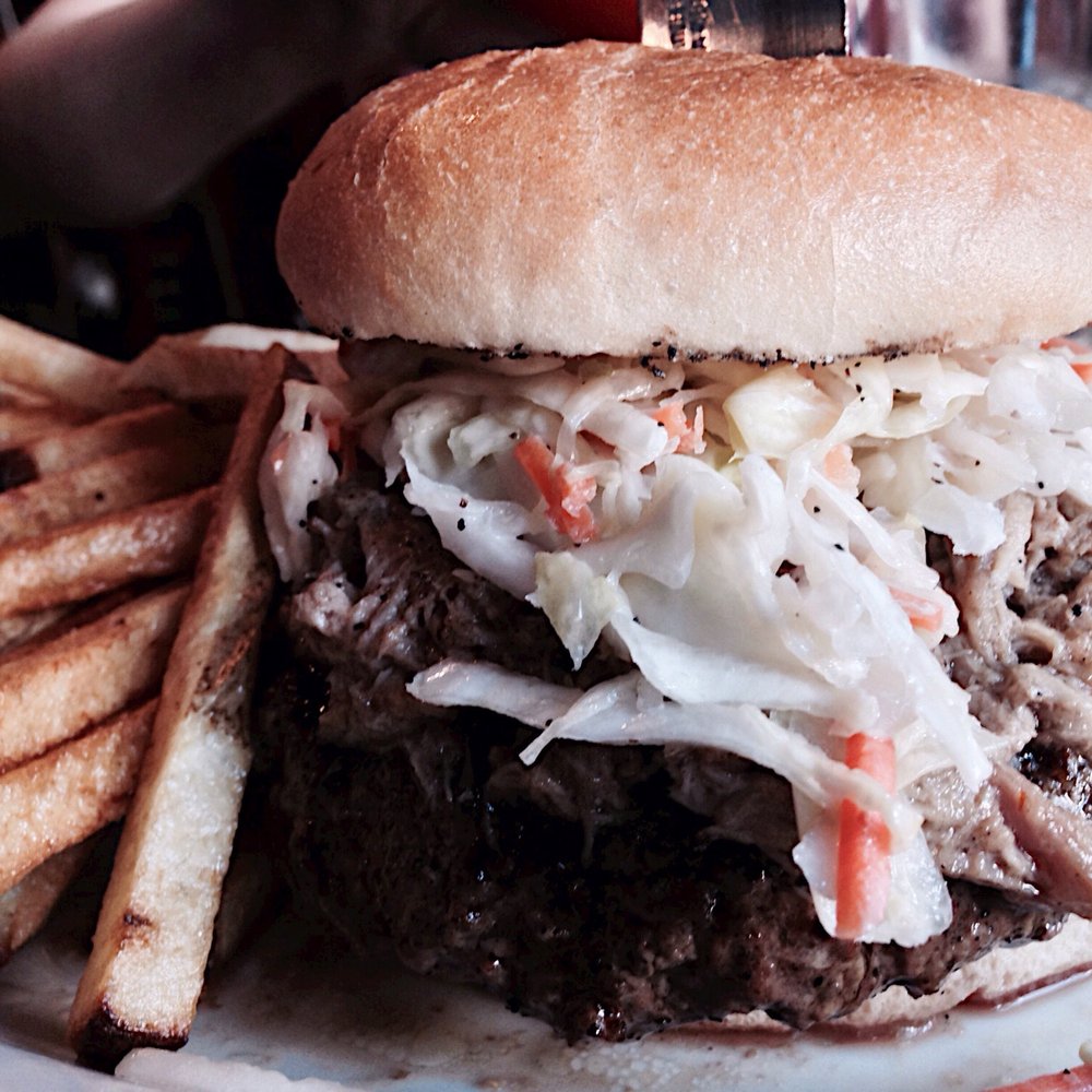 Baron's Pub - The NC (1/2 pound burger topped with pulled pork and coleslaw) with hand-cut fries $9 - American Near Me - Suffolk, Virginia Baron's Pub - The NC (1/2 pound burger topped with pulled pork and coleslaw) with hand-cut fries $9 - American Near Me - Suffolk, Virginia