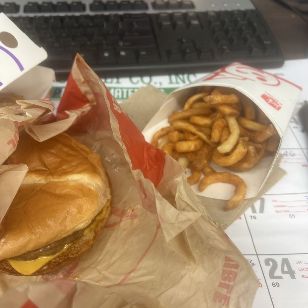 Jack in the Box - Sourdough jack combo! My ass cheese burger and what looks like the bottom of the bag curly fries bits. - Fast Food Near Me - San Pedro, California