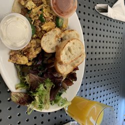 Mexican omelet on a flat bread, salad