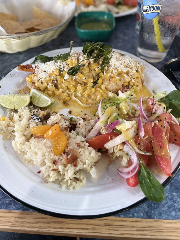 Mariscos el costenito Logo