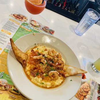 The Toasted Yolk Cafe - Shrimp & Grits & Strawberry Orange Mimosa - Breakfast & Brunch Near Me - Germantown, Tennessee