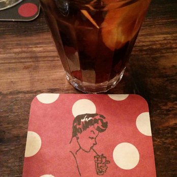 Casa Lolea - House made Vermut for €2.50 euros. Very good. It tastes kind of like a cinnamon or spiced plum flavor win or something. - Tapas Bars Near Me - Barcelona, B