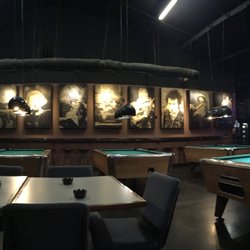 TC's Midtown Grill - Pool tables and sturdy bar on the wall for leaning on after that last drink.
