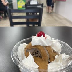 Remember When Ice Cream - Peanut butter chocolate brownie hard packed ice cream sundae with peanut butter, whipped cream, and a cherry. This is a small.