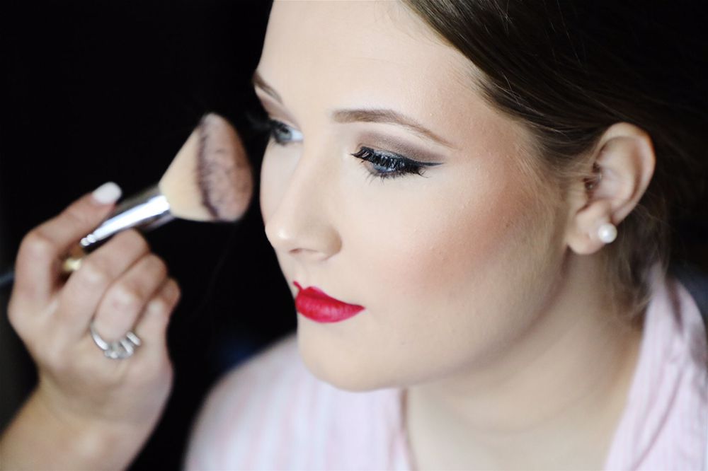 Merle Norman Cosmetic Studio Logo