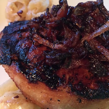 Finch & Fifth - Pork chops with bacon topping. Seared perfectly. - Bars Near Me - Augusta, Georgia