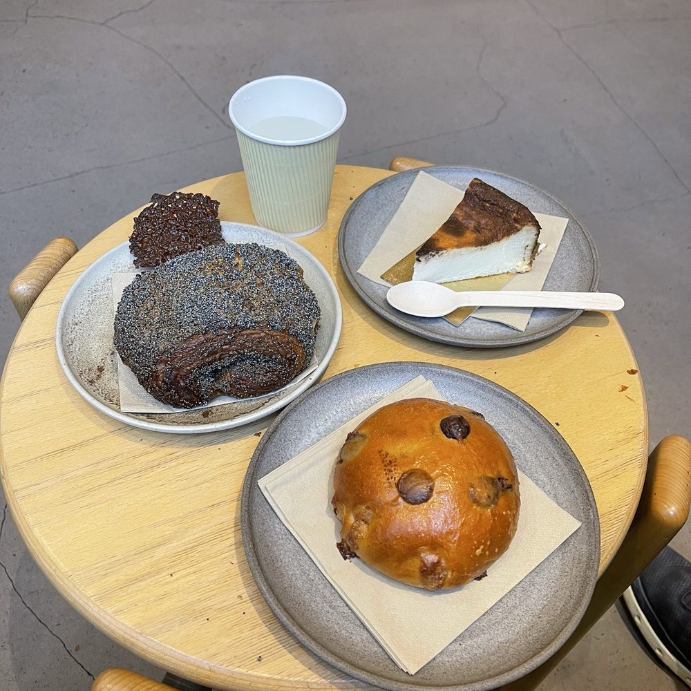 Poppy seed and marzipan croissant, basque cheesecake and bummer of a chocolate bun Poppy seed and marzipan croissant, basque cheesecake and bummer of a chocolate bun