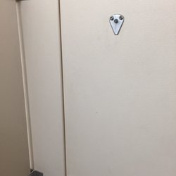The finest broken doors in the ladies room money can buy