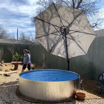 Covington's Nursery & Landscape - The stock tank with solar cover. Warmed to 75-80 degrees this winter without using the heater - Nurseries & Gardening Near Me - Rowlett, Texas