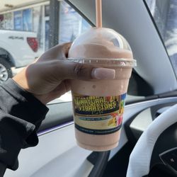 Natural Vibrations Smoothie Cafe - Strawberry , mango , pineapple smoothie with protein powder