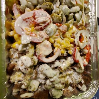 Kabul Halal Grill - Lamb over rice with only a thin layer of lamb covering 1/3 of the box what a disappointment - Halal Near Me - Central Islip, New York
