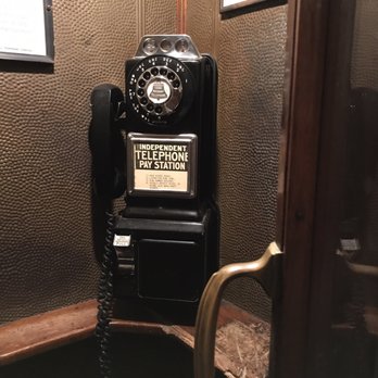 Settles Hotel - Restored phone booth that the lights and fan turn on when you step inside - super cool for this old school gal - Hotels Near Me - Big Spring, Texas