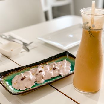 Aji Ceviche Bar - a plate of meringues and a drink - Peruvian Near Me - Orlando, Florida Aji Ceviche Bar - a plate of meringues and a drink - Peruvian Near Me - Orlando, Florida
