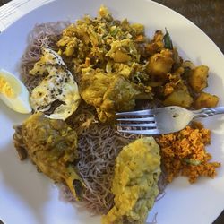 A little bit of everything, kottu, curry, Dahl, string hoppers and potato curry tempered. And if course sambol!