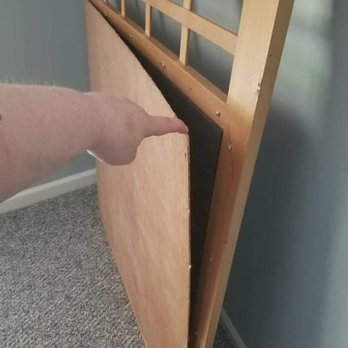 American Moving Experts - Can't figure how they didn't break the mirror but screws ripped out of backing. - Movers Near Me