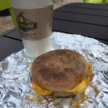 Coffee Underground - Large latte, and an English muffin-egg-cheese sandwich. Tastier than it might look. - Coffee & Tea Near Me - Greenville, South Carolina Coffee Underground - Large latte, and an English muffin-egg-cheese sandwich. Tastier than it might look. - Coffee & Tea Near Me - Greenville, South Carolina