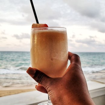 Social Restaurant - Pina Colada and views of the beach - Tapas Bars Near Me - San Juan, Puerto Rico Social Restaurant - Pina Colada and views of the beach - Tapas Bars Near Me - San Juan, Puerto Rico