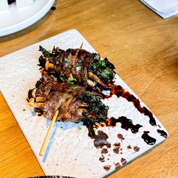 Shinya Shokudo - Wagyu Sukiyaki (mushroom and mizuna wrapped in American wagyu with tare sauce) - Izakaya Near Me - Seattle, Washington Shinya Shokudo - Wagyu Sukiyaki (mushroom and mizuna wrapped in American wagyu with tare sauce) - Izakaya Near Me - Seattle, Washington