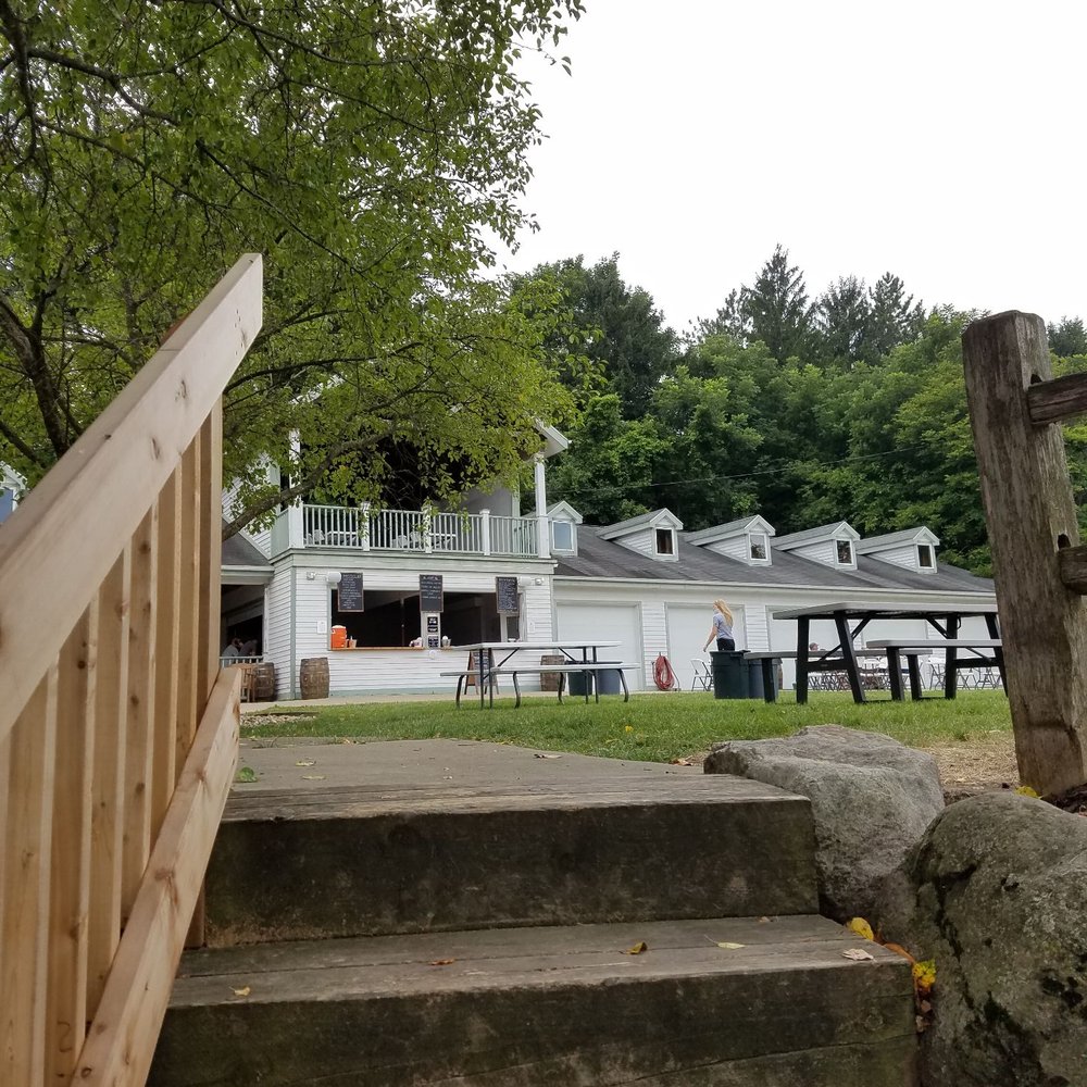 Stairs up to yard seating area