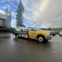Car on the tow getting dropped off Car on the tow getting dropped off