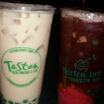 Tastea - Jasmine Milk Tea with boba (L) and Peach Me Sweetea with boba (R), both 32 oz - Coffee & Tea Near Me - Irvine, California Tastea - Jasmine Milk Tea with boba (L) and Peach Me Sweetea with boba (R), both 32 oz - Coffee & Tea Near Me - Irvine, California