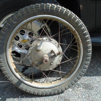 Tommy's Cycle Shop - My vintage Ariel wheel - with old antique rubber that needs to be removed. - Motorcycle Repair Near Me - Anoka, Minnesota Tommy's Cycle Shop - My vintage Ariel wheel - with old antique rubber that needs to be removed. - Motorcycle Repair Near Me - Anoka, Minnesota