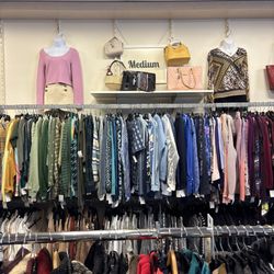 NU2U Consignment Fashions - Clothes are organized by size and color