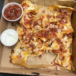 Green Peppers Restaurant - Meat nachos minus a few bites
