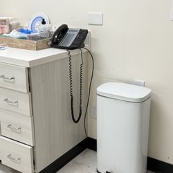 Tristan E. Bickman, MD - Dust on floor near trash bin like the floors haven't been mopped or cleaned in a long long time!