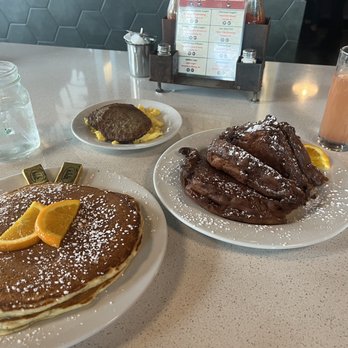 Backwater - lemon poppy pancakes, fried french toast, eggs/sausage & mimosa - Breakfast & Brunch Near Me - Melbourne, Florida Backwater - lemon poppy pancakes, fried french toast, eggs/sausage & mimosa - Breakfast & Brunch Near Me - Melbourne, Florida