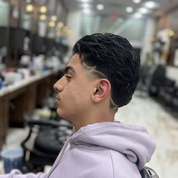 The Prince Haircut - High taper with design - Barbers Near Me The Prince Haircut - High taper with design - Barbers Near Me