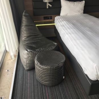 Moxy Amsterdam Houthavens - Cute little seating area in our room - Hotels Near Me - Amsterdam, New Hampshire