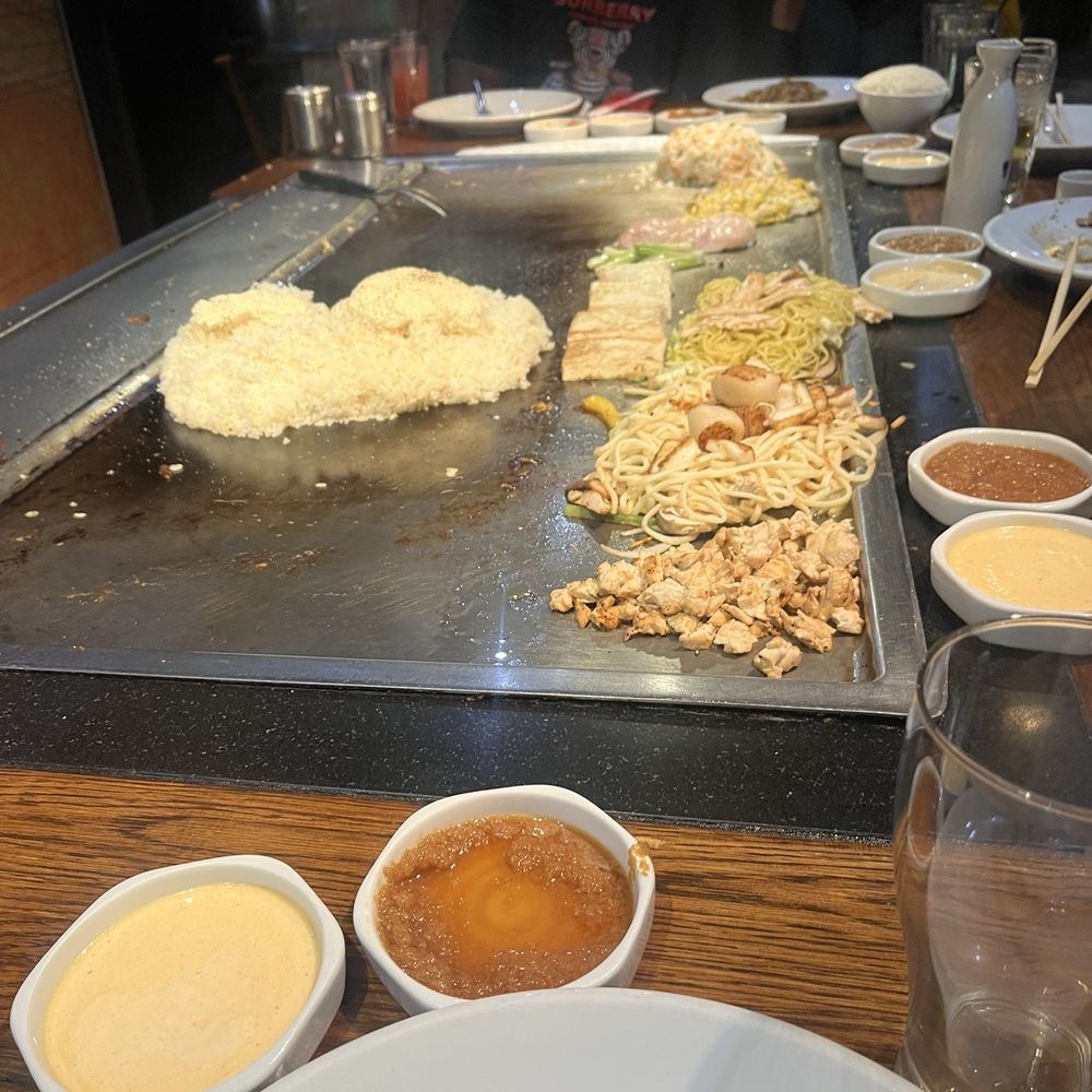 Benihana - Grilling the rice and noodles - Sushi Bars Near Me - Maple Grove, Minnesota Benihana - Grilling the rice and noodles - Sushi Bars Near Me - Maple Grove, Minnesota