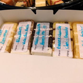 Confection Perfection - "Bonus box" of additional cake and filling flavors to try. It was hard to read some of the labels due to wash-out. - Custom Cakes Near Me - Marietta, Georgia Confection Perfection - "Bonus box" of additional cake and filling flavors to try. It was hard to read some of the labels due to wash-out. - Custom Cakes Near Me - Marietta, Georgia