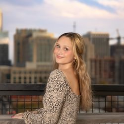 Jenn McKinney Photography - Holly Springs high school senior Portraits in front of Raleigh skyline.
