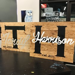 The Creative Canvas - A few of the beautiful signs built and created during one of our monthly Boards-N-Brushes events.