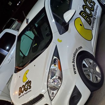 BOCA2 - a white car parked in a parking lot - Colombian Near Me - Buford, Georgia BOCA2 - a white car parked in a parking lot - Colombian Near Me - Buford, Georgia