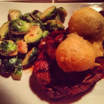 Painted Pony - Ribeye (MR) with creamed brussel sprouts topped with blue cheese fritters - New American Near Me - Saint George, Utah Painted Pony - Ribeye (MR) with creamed brussel sprouts topped with blue cheese fritters - New American Near Me - Saint George, Utah