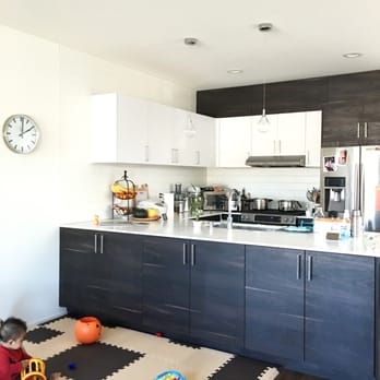 Abodian - Adding two cabinets and the doors to an existing open bookshelf under the kitchen counter. - Cabinetry Near Me - Seattle, Washington