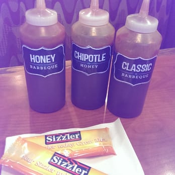 Sizzler - Extra flavor sauces to use for the AYCE Riblets and a moist towelette.  I use a knife and fork, mess free and no extra sauce 'tho - Seafood Near Me - Torrance, California