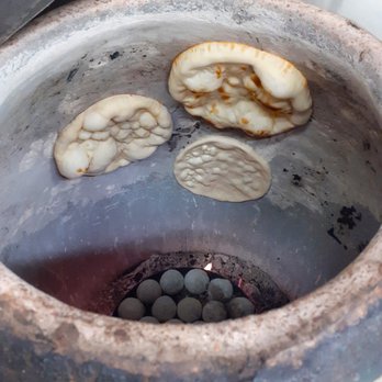 Salloos - Freshly Baked Naan at Salloos - Indian Near Me - London, XGL Salloos - Freshly Baked Naan at Salloos - Indian Near Me - London, XGL