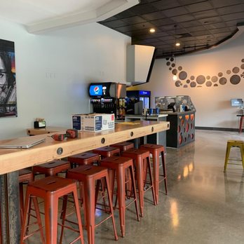 HomeSlice Pizza - a bar with red stools - Pizza Near Me - Durango, Colorado HomeSlice Pizza - a bar with red stools - Pizza Near Me - Durango, Colorado
