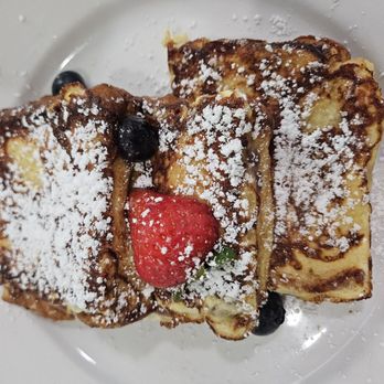 Sweet E's Cafe - Enchanting French Toast stuffed with cream cheese and blueberries. - Cafes Near Me - Honolulu, Hawaii Sweet E's Cafe - Enchanting French Toast stuffed with cream cheese and blueberries. - Cafes Near Me - Honolulu, Hawaii